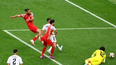 Jordan's Yazan Al Arab scores their second goal. Reuters