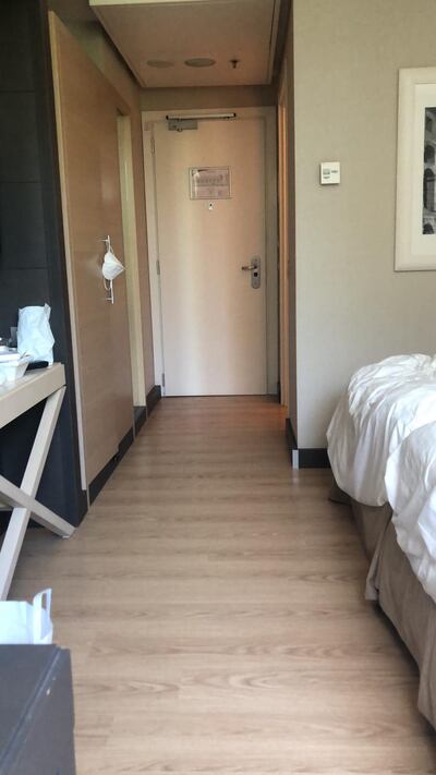 Simon Collingwood ran 5km in his room in Italy during hotel quarantine.