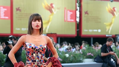 Nicole Macchi wears a gown by Palestinian designer Ihab Jiryis. Getty Images