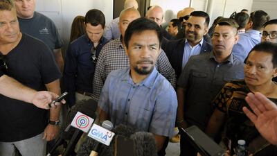 epa06048914 Filipino boxer Manny Pacquiao leaves the Worship Centre Christian Church in Carina, Brisbane, Queensland, Australia, 25 June 2017. Pacquiao is in Australia for his 02 July world title fight defense against Australian boxer Jeff Horn. EPA/ROBERT SHAKESPEARE AUSTRALIA AND NEW ZEALAND OUT