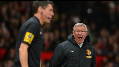 Alex Ferguson, right, may rant at referees but is strict on players if they do not give them respect. Andrew Yates / AFP