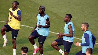 From left, France's Rio Mavuba, Bacary Sagna, Blaise Matuidi and Karim Benzema take part in a training session at the Santa Cruz Stadium in Ribeirao Preto on June 11, 2014, ahead of the 2014 Fifa World Cup in Brazil. Franck Fife / AFP