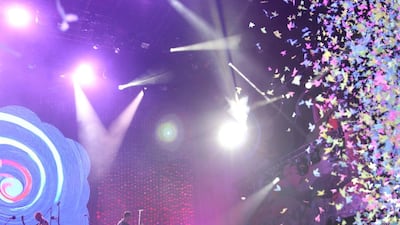 They left the stage with the Du Arena crowd showered in confetti and playing with giant balloons like happy children. Navin Khianey for The National