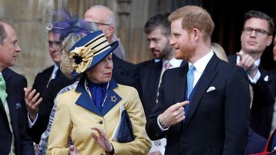 Prince Harry, Duke of Sussex, talks with his aunt, Princess Anne, Princess Royal, as they leave St George's Chapel. AFP