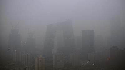 The China Central Television (CCTV) building and the Central Business District (CBD) area are seen amid heavy smog. Reuters
