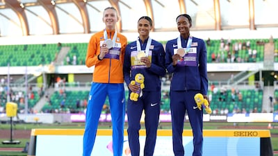 Silver medalist Femke Bol of Netherlands, gold medalist Sydney McLaughlin US and bronze medalist Dalilah Muhammad of US. AFP