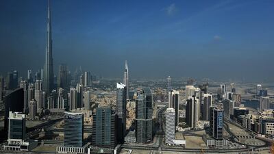 Despite declining oil prices, business leaders in the Gulf remain confident in the economy. Satish Kumar / The National