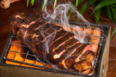 Chef Shawn Lazaroo flame-grills chunky cuts of aged beef at South American-inspired Amazonas. Photo: Amazonas