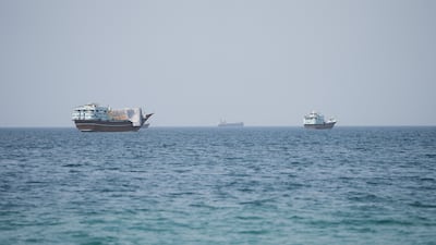 FILE PHOTO: Vessels near the Strait of Hormuz, as seen from Musandam, Oman, August 6, 2026. REUTERS / Stringer / File Photo