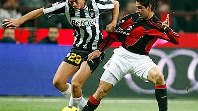 AC Milan's Pato, right, challenges Juventus's Paolo De Ceglie during the two teams' meeting in October. Antonio Calanni / AP Photo