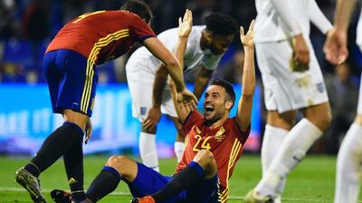 Mario Gaspar celebrates with Paco Alcacer Garcia after he scoring the opening goal. Mike Hewitt / Getty Images