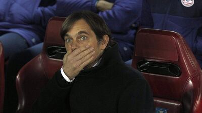 PSV Eindhoven’s head coach Phillip Cocu reacts during the Uefa Champions League Round of 16 second leg match between Atletico Madrid and PSV Eindhoven at Vicente Calderon stadium in Madrid, Spain, 15 March 2016. EPA/KIKO HUESCA