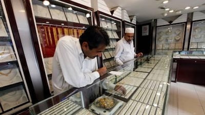 Mohammed Qaisser, left, with Mohammed Saleem, the owner of Al Masoum Jewellery in Sharjah.