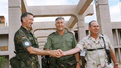 The United Nations forces commander, Cevik Bir, centre, greets the UN's German Maj Gen Georg Bernhardt, left, and US army Gen John Montgomery, right, in Mogadishu, Somalia, in 1993.