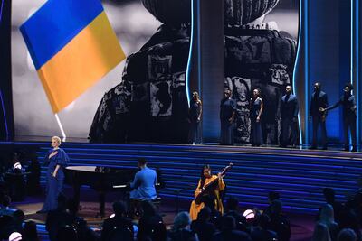 John Legend and Ukrainian singer Mika Newton perform onstage during the 64th Annual Grammy Awards at the MGM Grand Garden Arena in Las Vegas on April 3, 2022. AFP