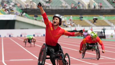 Yang Hu of China celebrates winning the gold medal in the Men's 400m T54 final at the World Para Athletics Championships in Kobe, in Japan's Kansai region. Getty images