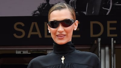 Palestinian-American model Bella Hadid pairs Tom Ford with a key necklace at the 2026 Cannes Film Festival. GC Images