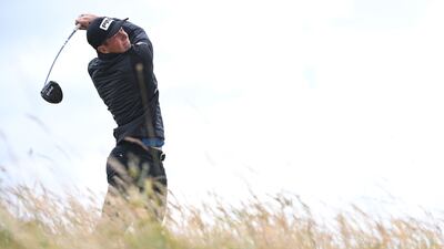 Norway's Viktor Hovland watches his drive from the sixth tee on his way to an opening-round 68 for four under par. AFP