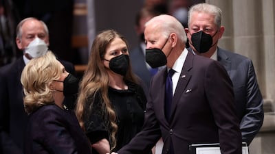President Biden greets former US secretary of state Hillary Clinton with her daughter, Chelsea Clinton, and former US vice president Al Gore in the foreground. AFP