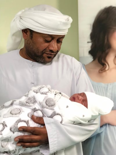 Omani Ali Suhail Amer with his new born son, born at NMC Hospital in Al AIn, shortly after Eid Al Fitr was announced. NMC
