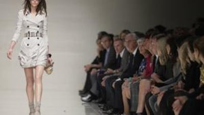 A model presents a creation by Burberry during the Spring/Summer 2010 collection show on the fifth day of the London Fashion Week.
