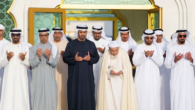 Sheikh Mohamed, Sheikh Mansour, Sheikh Saif bin Zayed, Deputy Prime Minister and Minister of Interior, Sheikh Nahyan bin Zayed, Chairman of the Zayed for Good Foundation, Sheikh Abdullah bin Bayyah, and Dr Omar Al Darei, Chairman of the General Authority for Islamic Affairs, Endowments and Zakat, pray at the grave of UAE Founding Father, the late Sheikh Zayed bin Sultan Al Nahyan