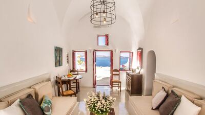3. Elegant on the inside, and unique on the outside, this Santorini cave house with an outdoor plunge pool is one of Airbnb's most wishlisted.