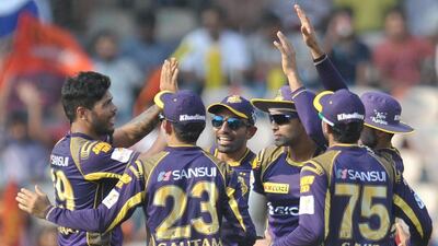 Kolkata Knight Riders bowler Umesh Yadav, left, celebrates a wicket with teammates during their IPL win against Sunrisers Hyderabad on Saturday. Noah Seelam / AFP / April 16, 2016