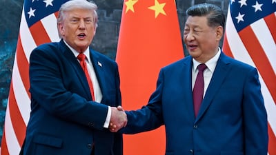 Donald Trump with Xi Jinping at the Great Hall of the People. AFP
