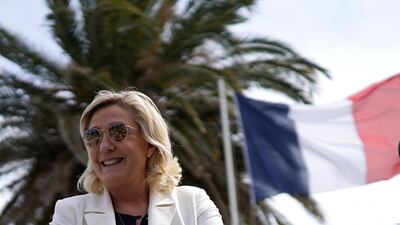 Marine Le Pen, the leader of France's far-right National Rally party, visits a diving school in southern France. AP