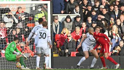 Liverpool midfielder Fabinho scores the opening goal against Brentford. AFP