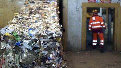 An employee at the Malagrotta landfill near Rome in December 2013. Italian businessman Manlio Cerroni, who built a global empire and a personal fortune on trash, faces trial over allegations he monopolised trash disposal in and around the Italian capital using a web of companies and individuals. Alessandro Bianchi / Reuters