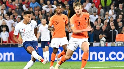 Lingard, left, scores his side's second goal before his goal was disallowed for offside following a VAR review. AP Photo