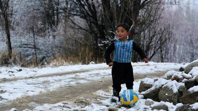 Five-year-old Murtaza Ahmadi plays football in the Jaghori district of Ghazni province. The Afghan boy has become an internet star after pictures of him wearing an Argentina football shirt made out of a plastic bag, complete with his hero Lionel Messi’s name went viral. AFP