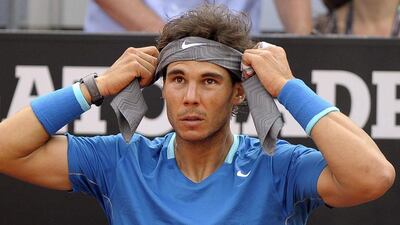 Rafael Nadal reacts during the Rome Masters final against Novak Djokovic, which he lost. Claudio Onorati / EPA / May 18, 2014