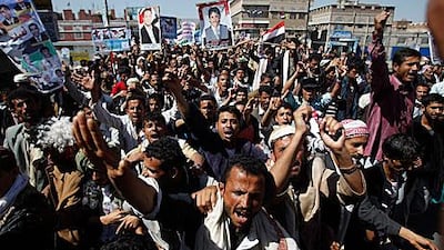 Anti-government protesters demand a trial for Yemen’s president, Ali Abdullah Saleh, in Sanaa yesterday. As Mr Saleh arrived in the US yesterday, seeking treatment for wounds sustained during an assassination attempt, a number of military units joined in protests against his rule.
