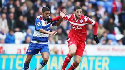 Pavel Pogrebnyak, left, and Adam Le Fondre of Reading are dejected after failing to score Sunday against QPR. Richard Heathcote / Getty Images