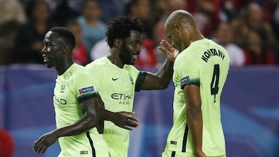 Manchester City players Vincent Kompany, right, and Wilfried Bony celebrate a goal during their Champions League win over Sevilla on Tuesday night. Andrew Boyers / Action Images / Reuters / November 3, 2015