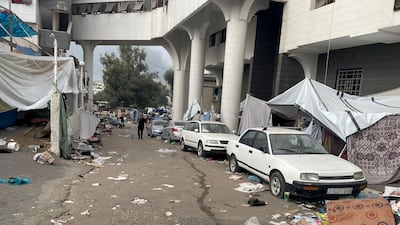 A man walks within the premises of Al Shifa Hospital during the Israeli ground operation in Gaza city. Reuters