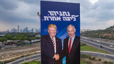 An election campaign billboard of the Likud party showing US President Donald Trump and Israeli Prime Minister Benjamin Netanyahu in Tel Aviv, in 2019. AP