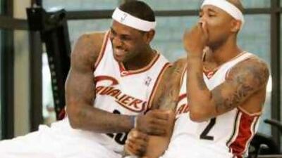 Cleveland Cavaliers' LeBron James, left, jokes with new teammate Mo Williams in Independence, Ohio, on Monday.