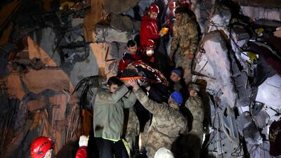 Cennet Sucu is rescued from beneath the rubble of collapsed hospital in Iskenderun. Reuters