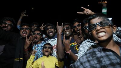 Fans react to his appearance on the screen. EPA