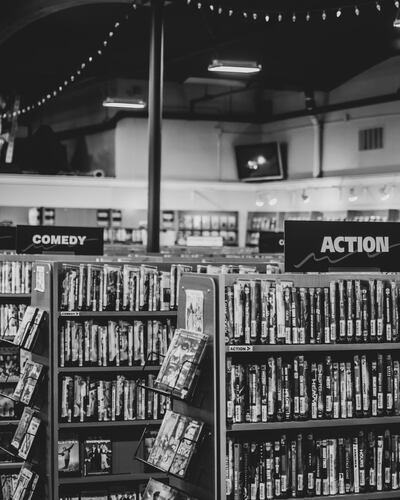 Anyone looking to create their own nostalgic movie marathon can call the store for film recommendations and retro Blockbuster merchandise. Unsplash
