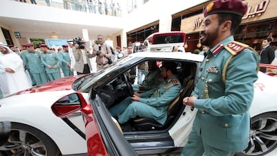 Lt Gen Saif Al Shafar, undersecretary of the Ministry of Interior, centre, launches Gulf Traffic Week at Yas Mall in Abu Dhabi, to encourage safer driving. Christopher Pike / The National
