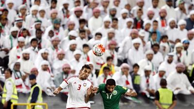 Saudi Arabia’s Taiseer Al-Jassam(R) fights for the ball with Walid Abbas(L) player of United Arab Emirates(UAE) during the FIFA World Cup 2018 Asian qualifying Group A soccer match between UAE and Saudi Arabia at Mohammed Bin Zayed Stadium- Aljazira Club in Abu Dhabi, United Arab Emirates on 29 March 2016. EPA/ALI HAIDER