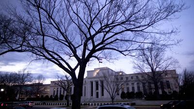 The US Federal Reserve in December announced that the Federal Open Market Committee had decided to start from January this year to taper its monthly purchase of securities by US$10 billion. Brendan Smialowski / Bloomberg News
