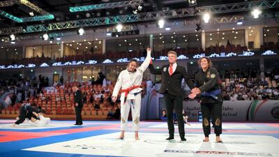 Ishtar Azzawi, left, wins the 70kgs blue-belt final at the Abu Dhabi World Professional Jiu-Jitsu Championship 2019.