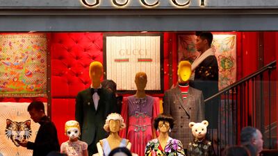 A Gucci sign is seen outside a shop in Paris, France. The company After growing 45% last year, Gucci is setting its sights on $12bn in revenues. Charles Platiau / Reuters