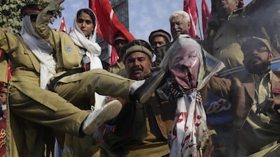 Supporters of the Pakistani civil society group Khaksar Tehreek, protest against Donald Trump in Lahore earlier this week. AP